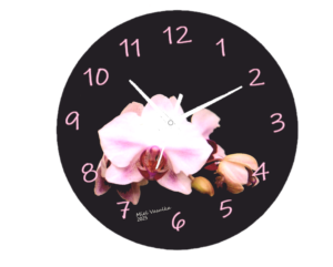 Orchid Clock featuring delicate orchid flowers with an easy-to-read clock face.